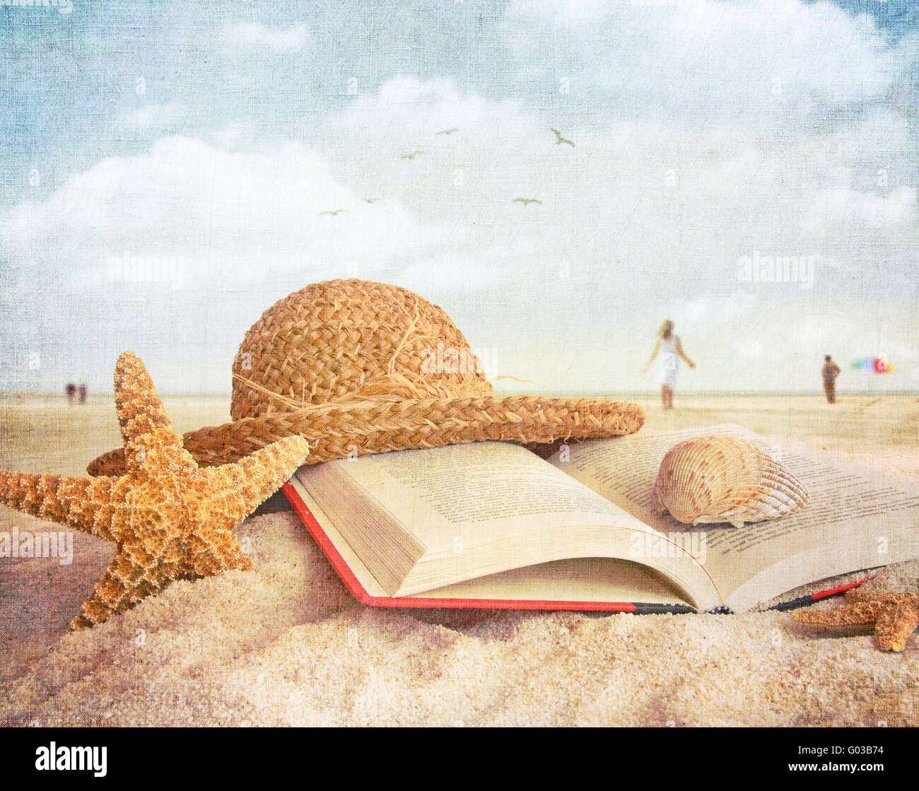 Straw hat , book and seashells on the beach Stock Photo - Alamy
