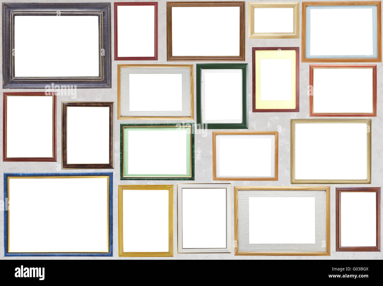 Various wooden photo frames hang on a wall Stock Photo Alamy