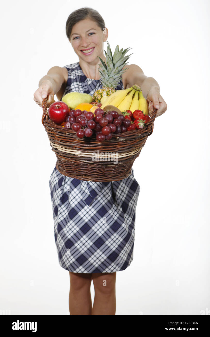 lady with basket of fruit Stock Photo - Alamy