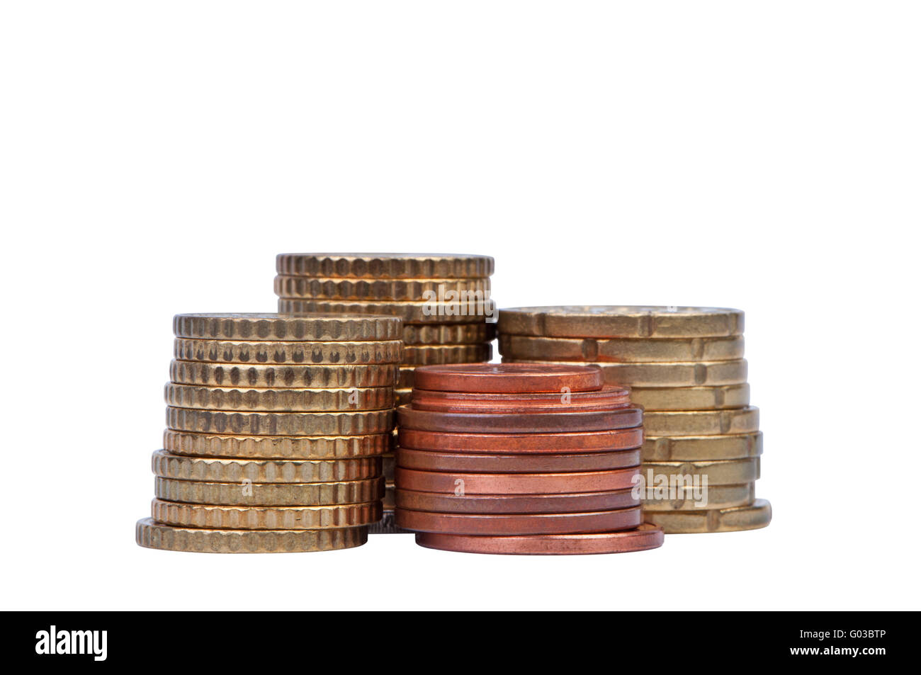 Stacks of coins isolated on white background. Stock Photo