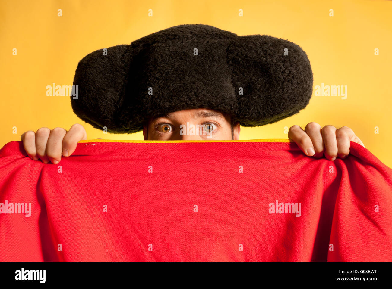 Bullfighter Afraid With Big Montera Hidden Behind Cape Humor Spanish Colors Stock Photo Alamy