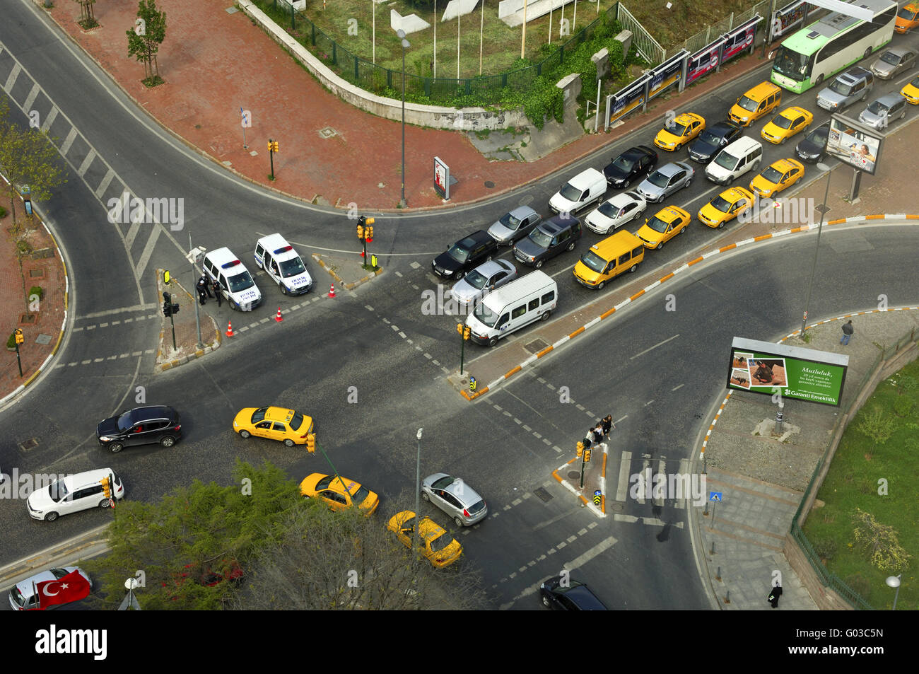 busy intersection with yellow cabs, Istanbul Stock Photo