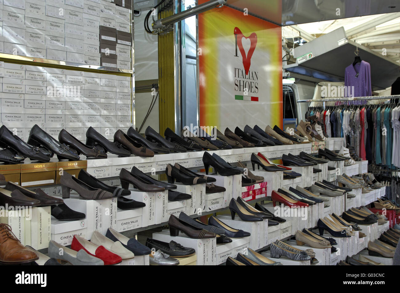 Market stall selling Italian shoes, Luino, Italy Stock Photo