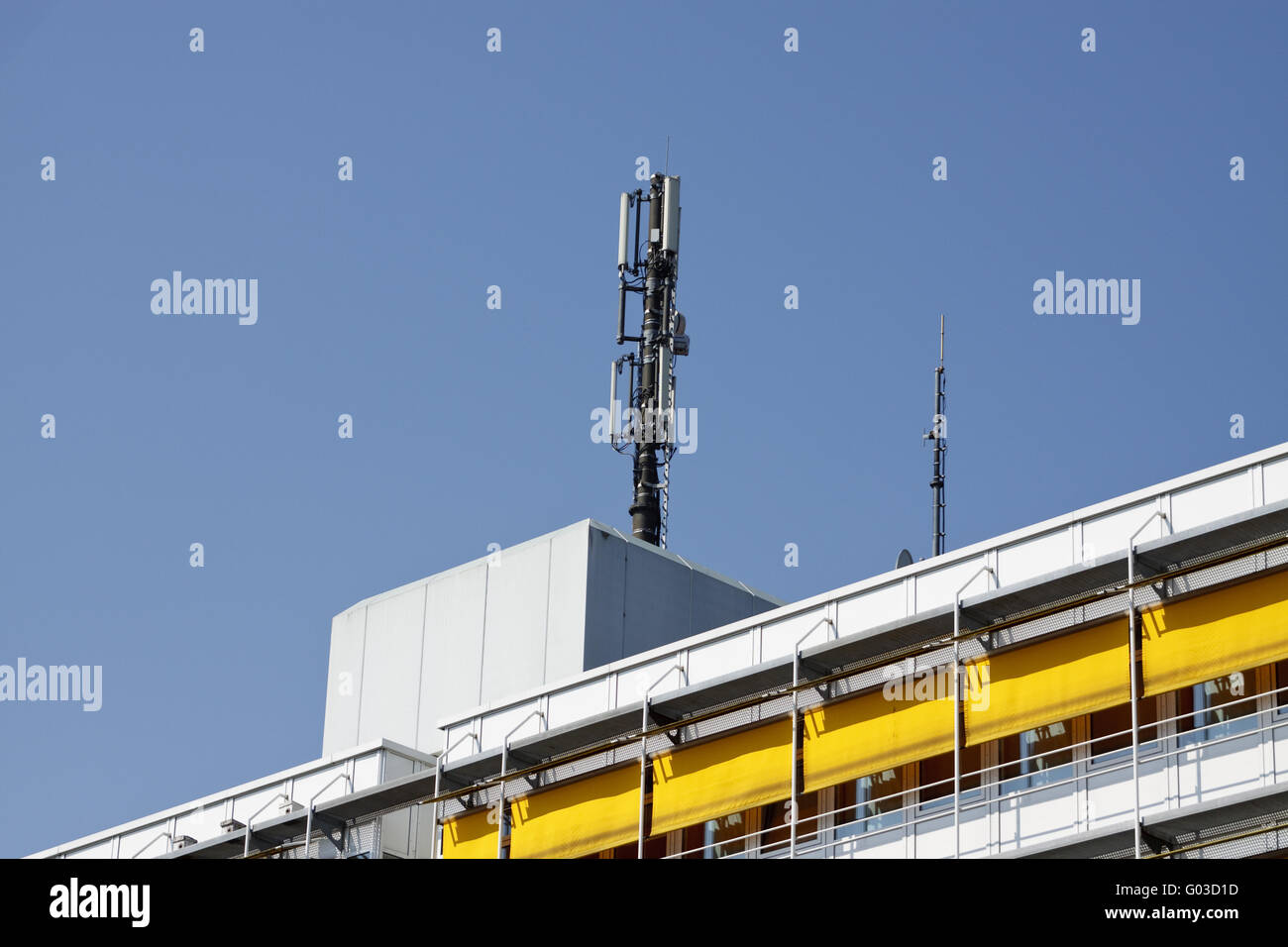 cell tower on a  archi.highrise Stock Photo