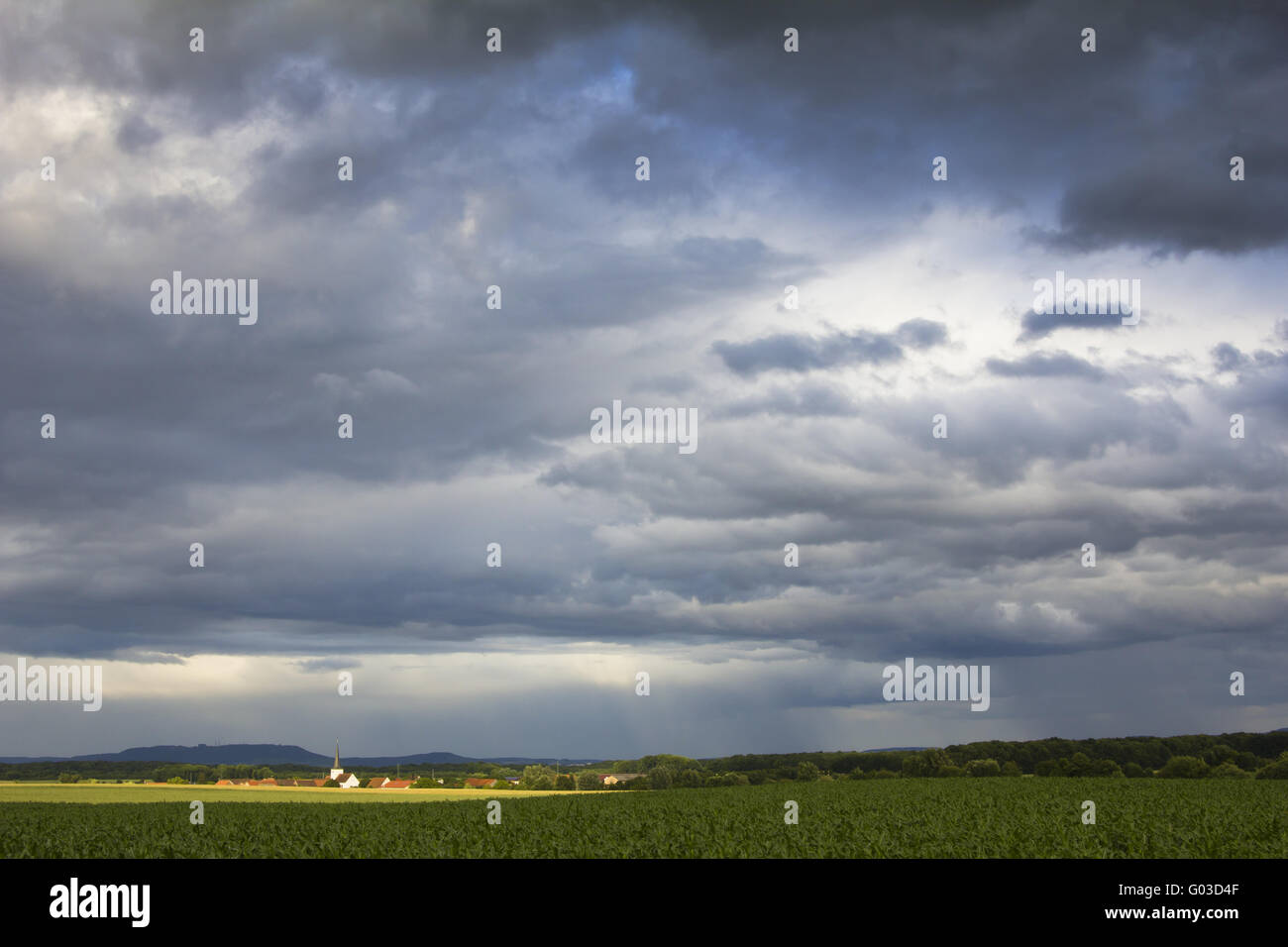 Germany Raintown Rain clouds above a small village in Germany Stock Photo - Alamy