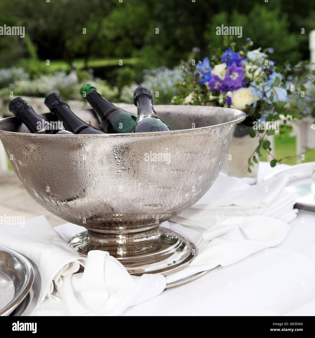 Many bottles of champagne in a champagne cooler Stock Photo
