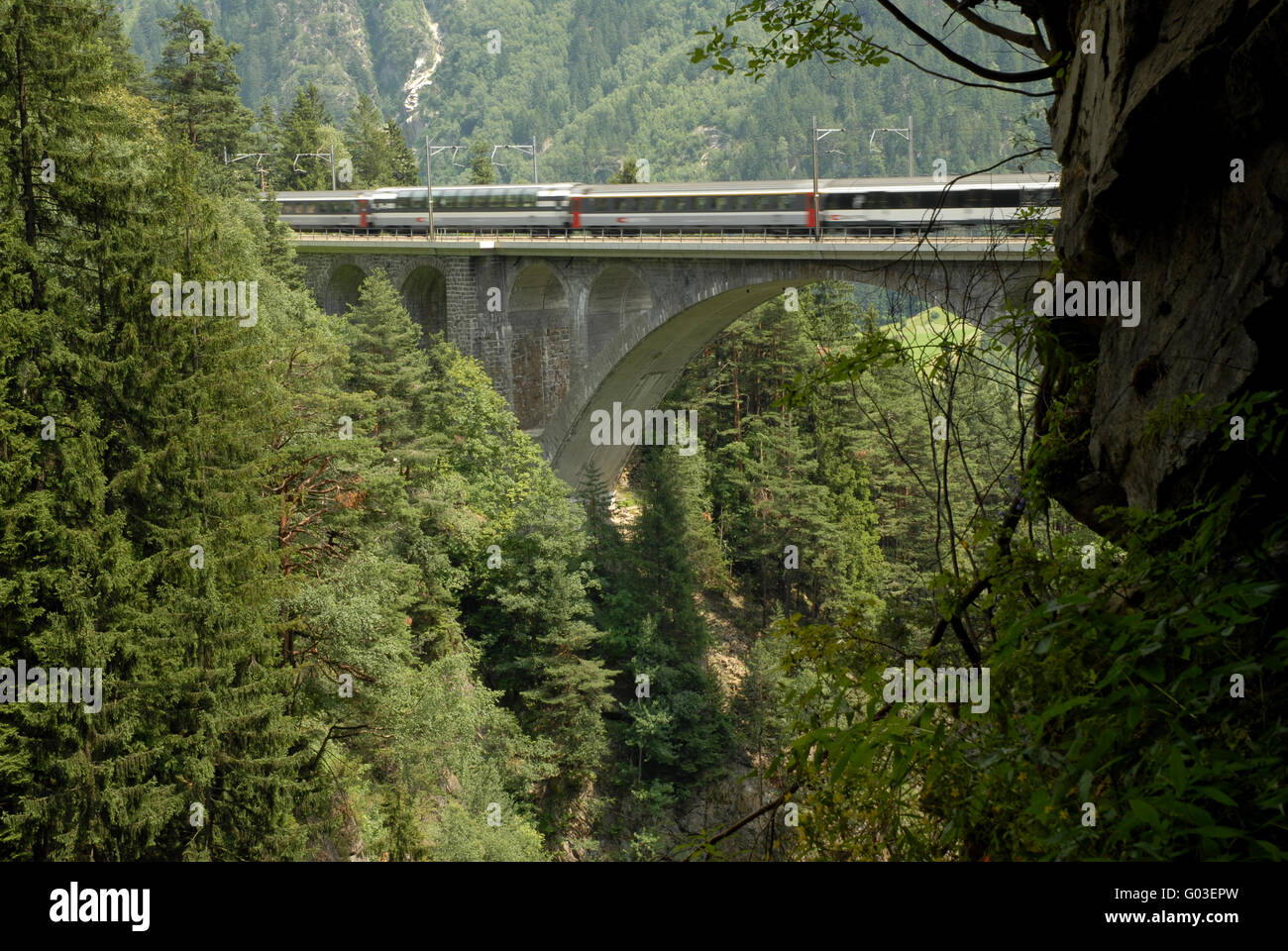 Gotthard railway trafersing a viaduct, Switzerland Stock Photo