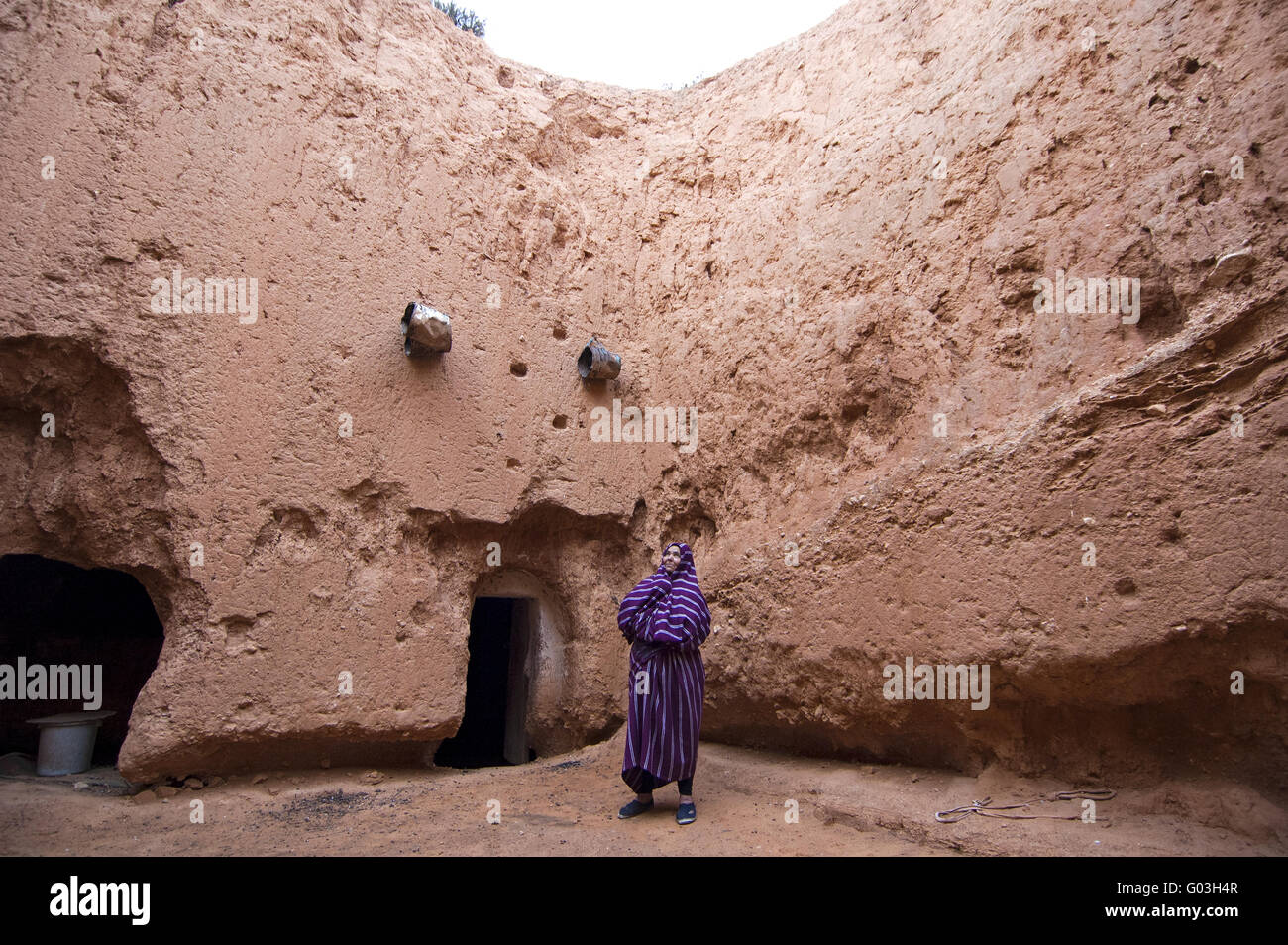 Berber woman in her cave dwelling, Ghariyan, Libya Stock Photo