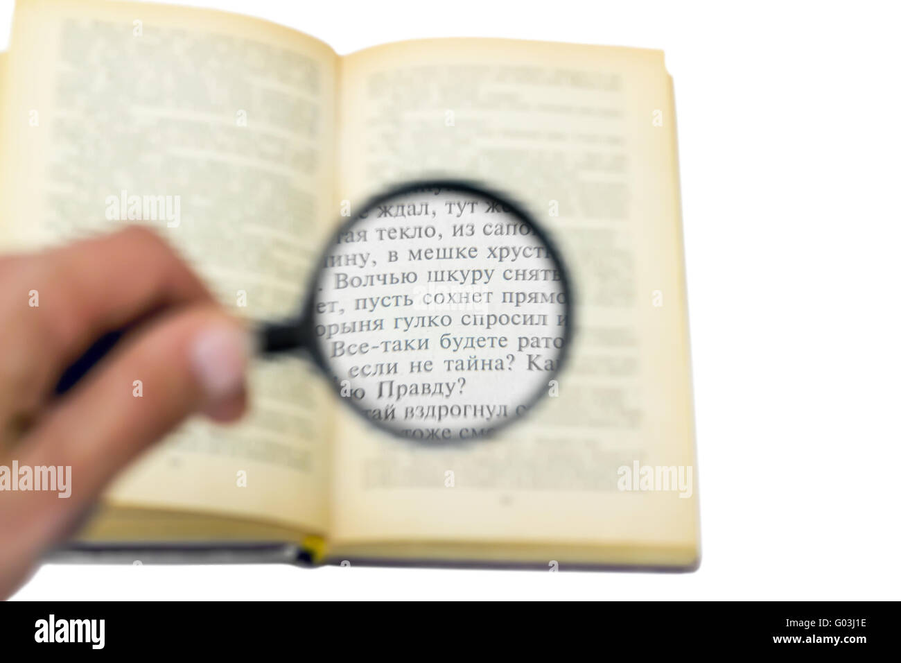 open book under a magnifying glass isolated on whi Stock Photo - Alamy