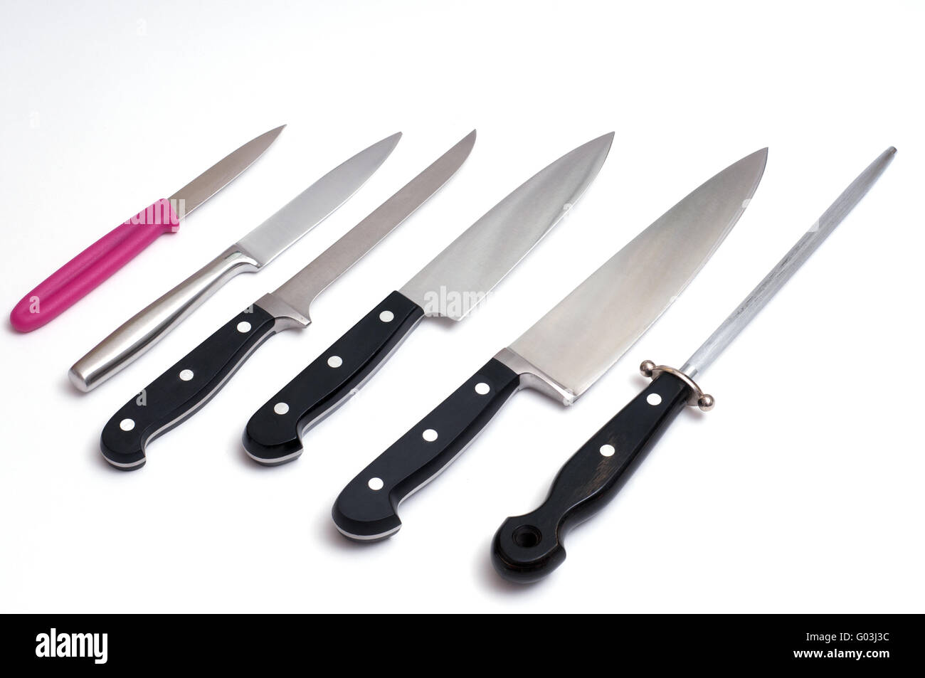 Different cooking knifes with sharpening steel Stock Photo