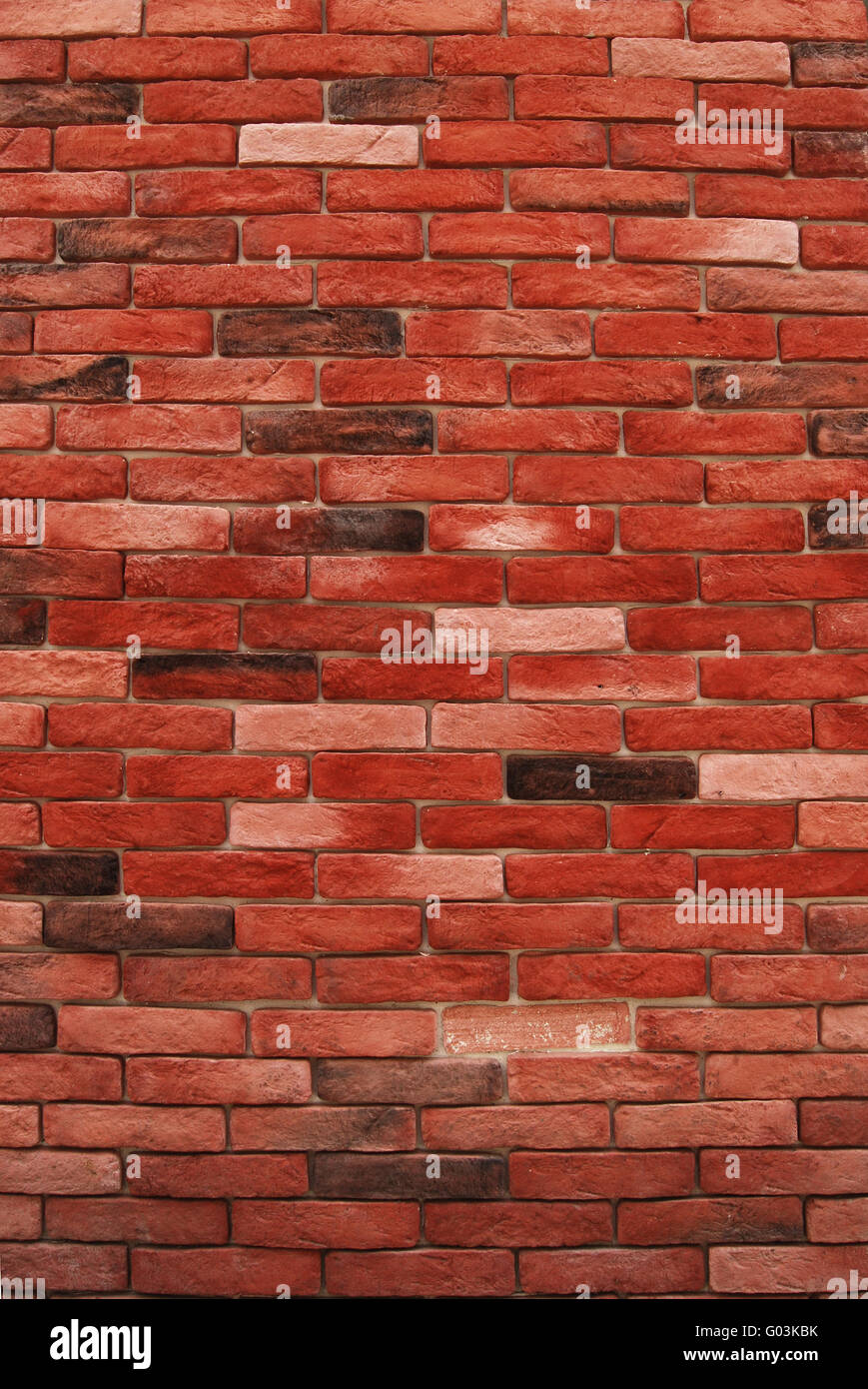 Red Decorative Bricks Wall Vertical As Background Stock Photo