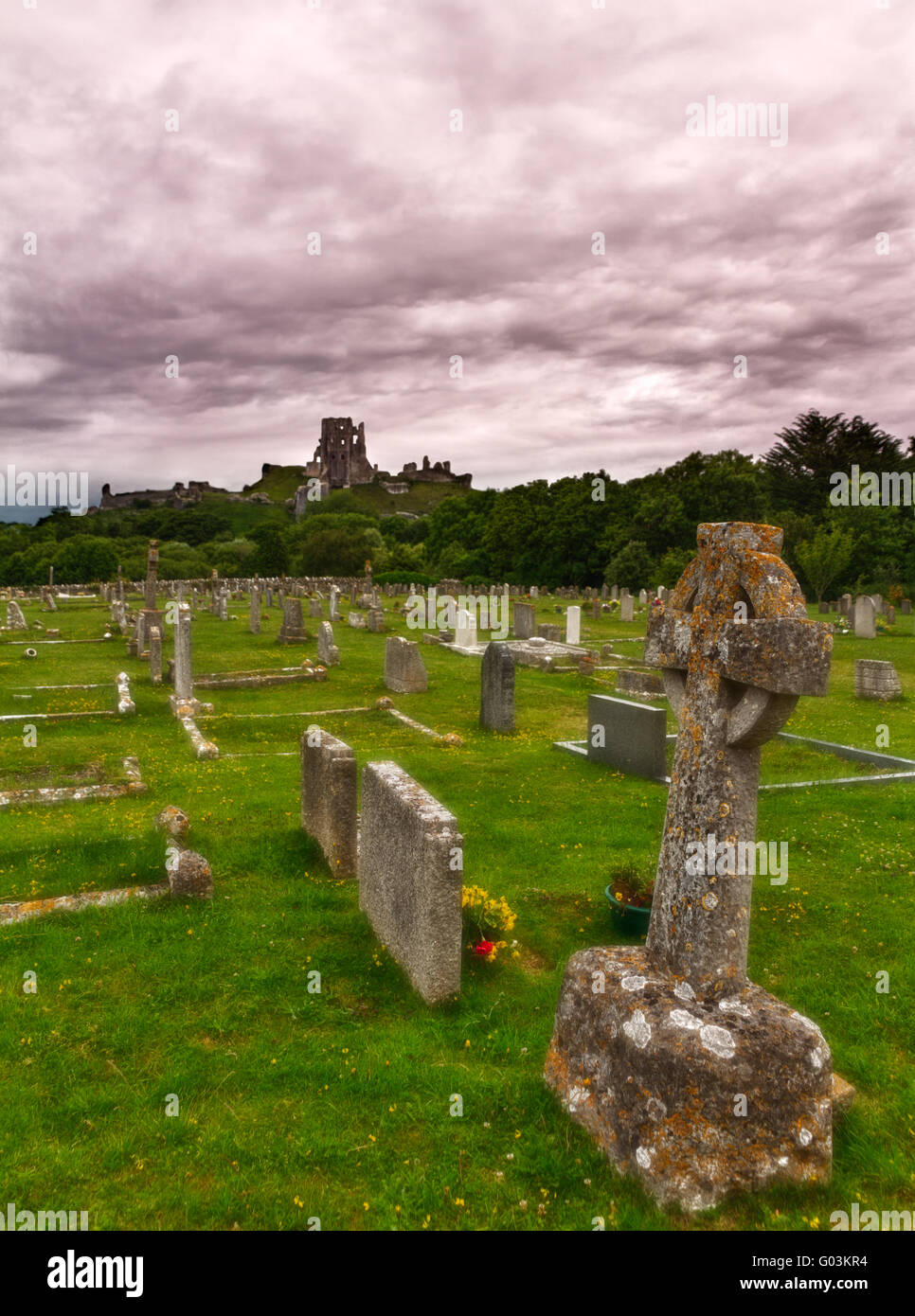 Corfe Castle with cemetery, Dorset, England Stock Photo