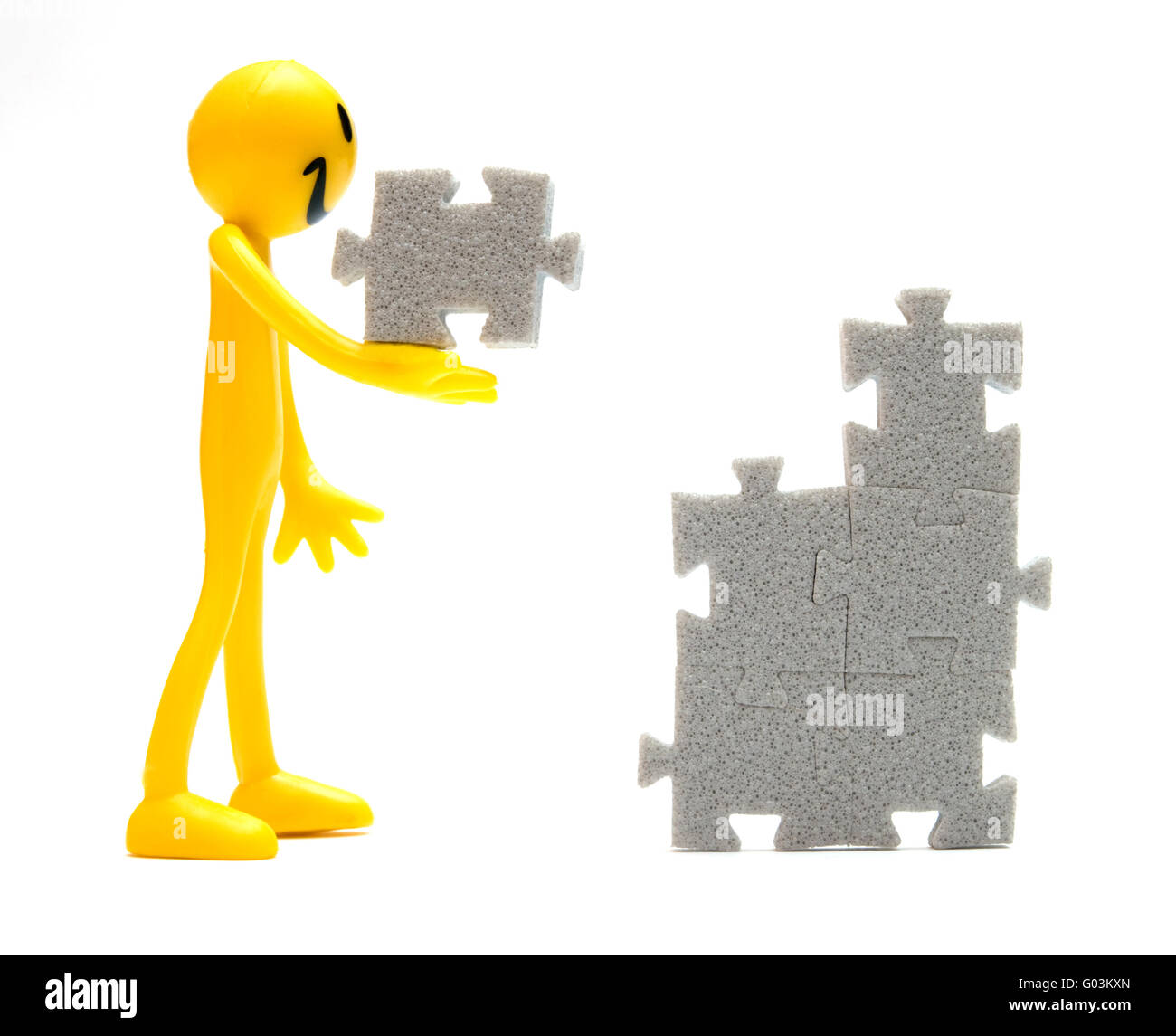 Putting pieces of puzzles together. Conceptual image Stock Photo Alamy