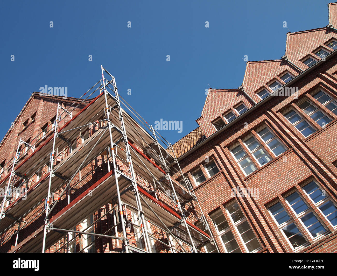 clinker facade with scaffolding Stock Photo