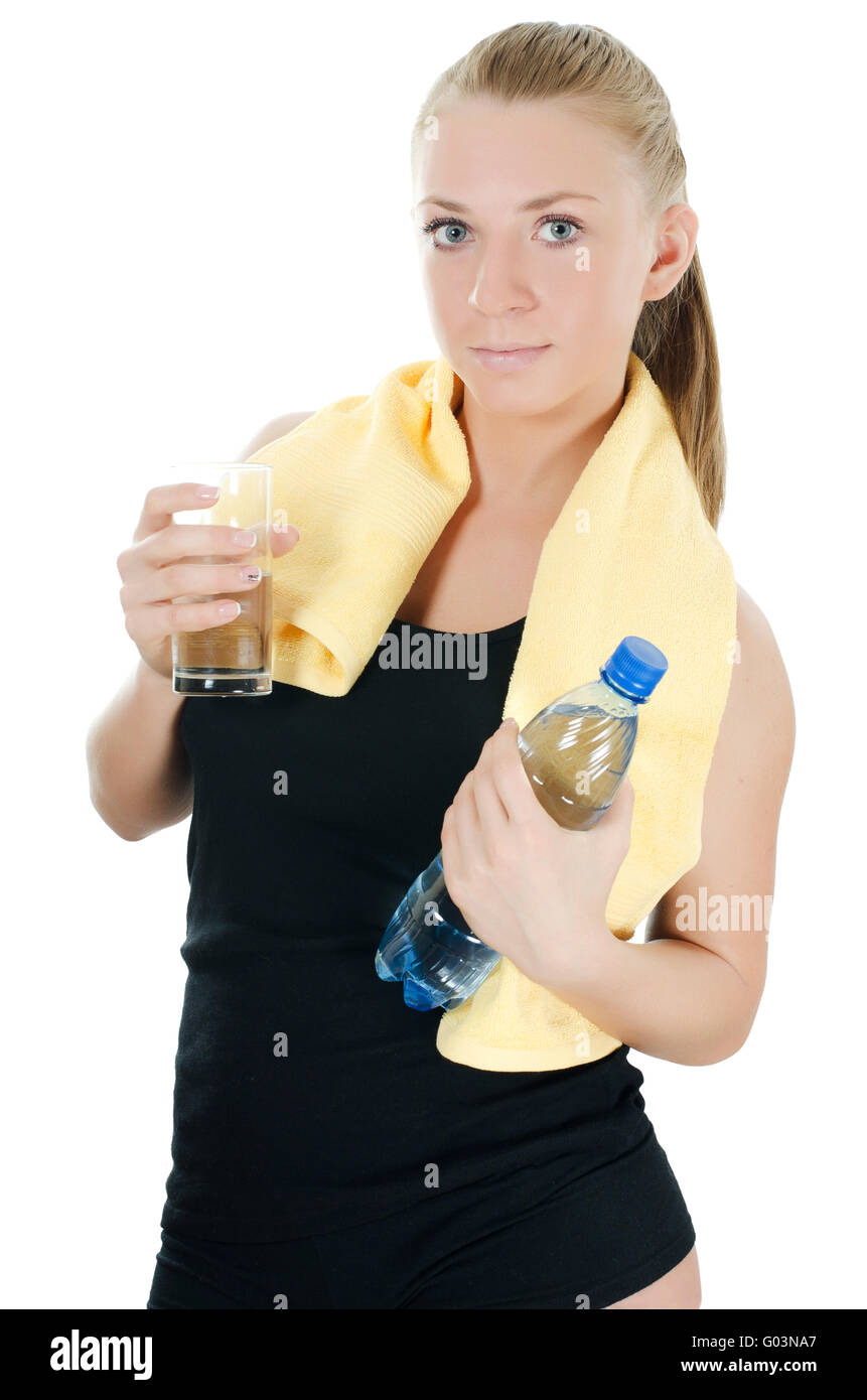 The sports girl with a towel and a water bottle Stock Photo - Alamy