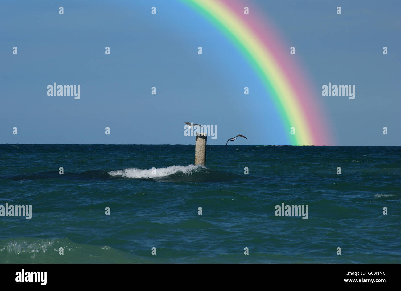 rainbow over the sea Stock Photo - Alamy