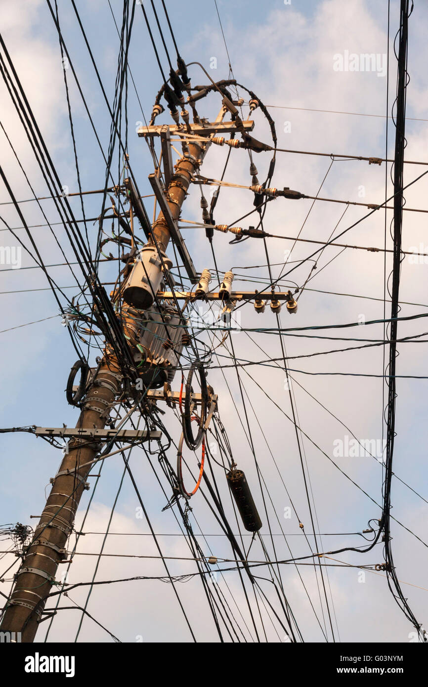 Messy overhead power cables in Japan Stock Photo Alamy