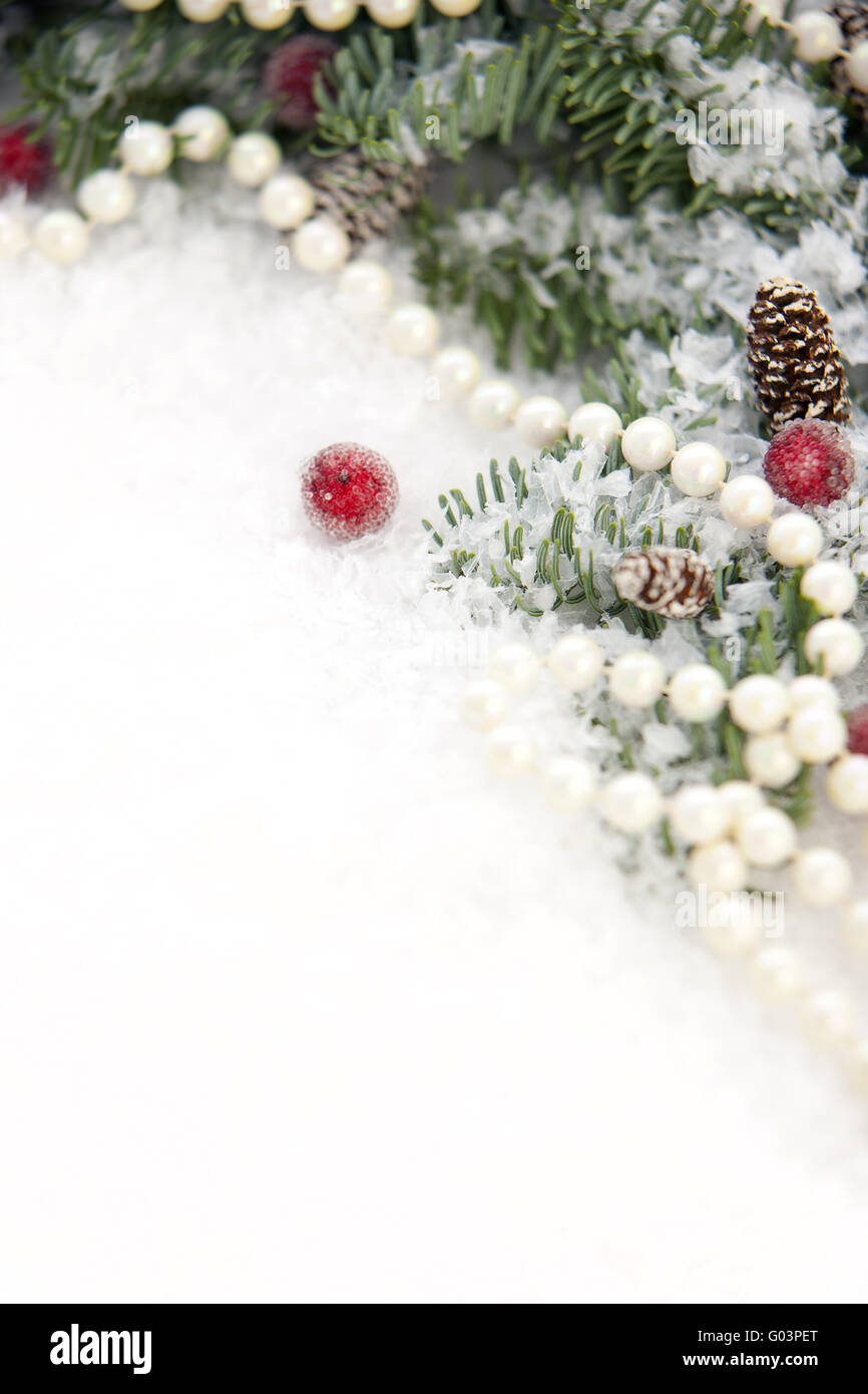 Blue spruce in snow and Christmas decorations Stock Photo