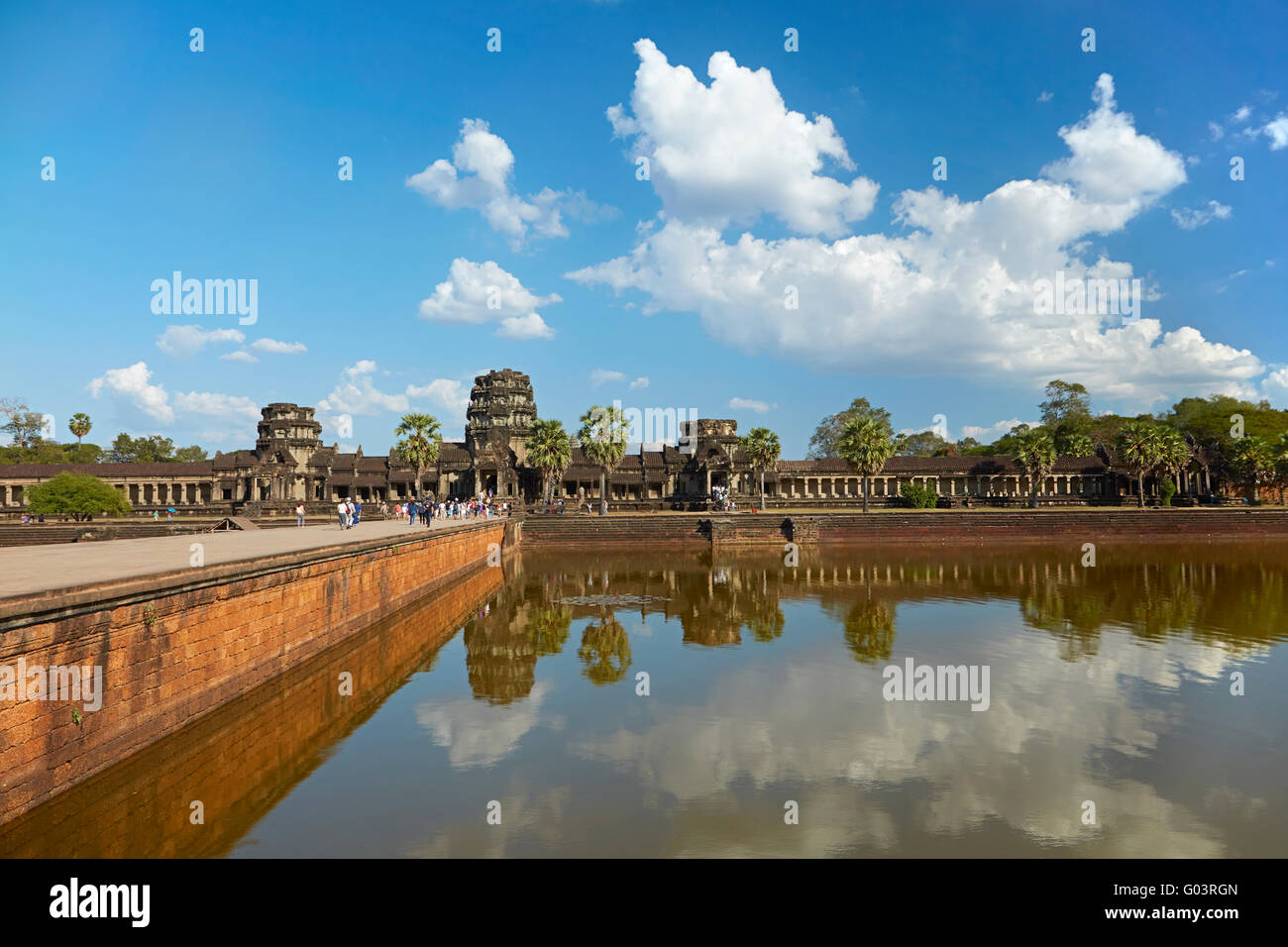 Ancient sandstone causeway crossing the moat to Angkor Wat (12th