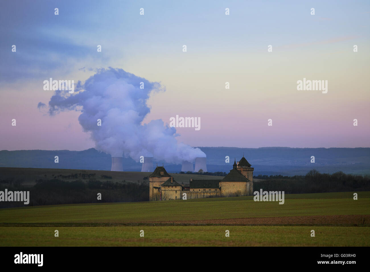 Malbrouck castle, cooling towers of nuclear plant Stock Photo