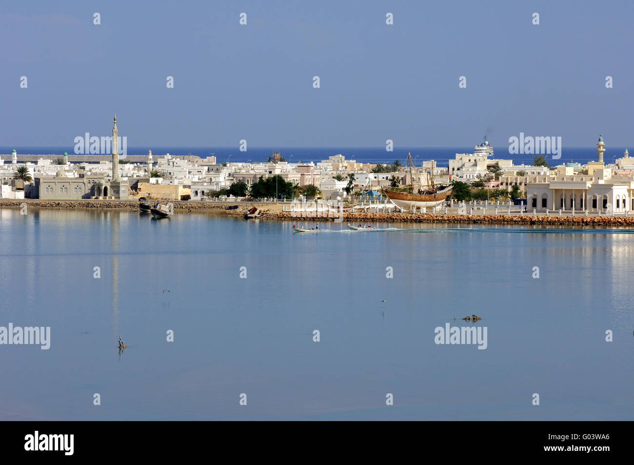 View across the lagoon at the harbour town Sur Stock Photo