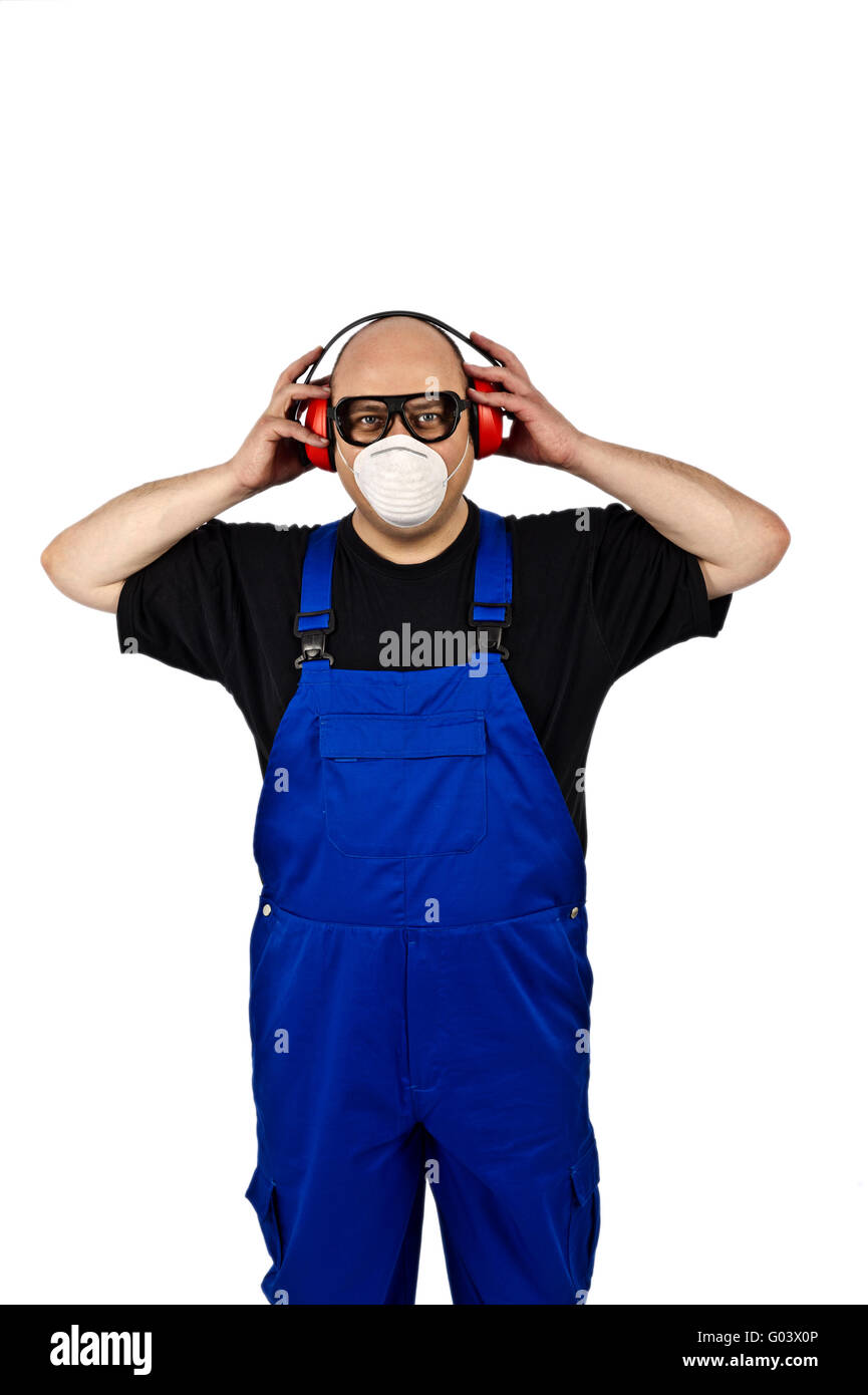 Construction workers with face-shields and hearing Stock Photo