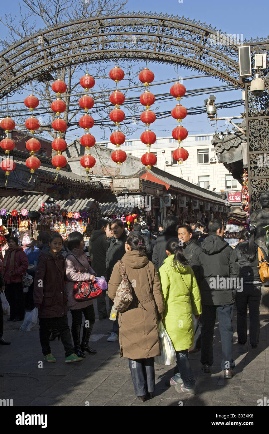 Entrance with red lanterns to a market, Beijing Stock Photo