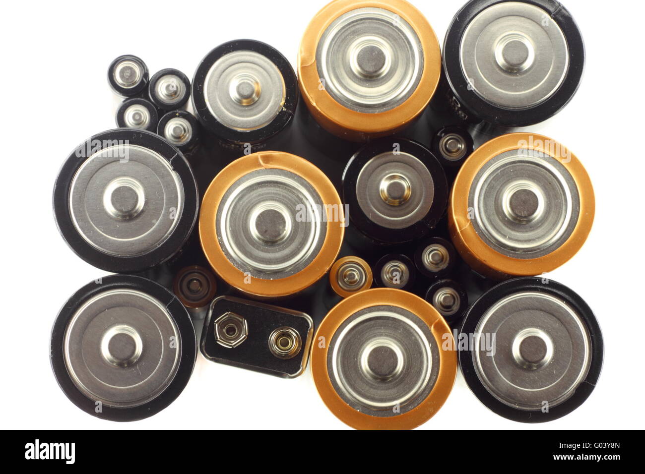 Many various batteries on the white background Stock Photo