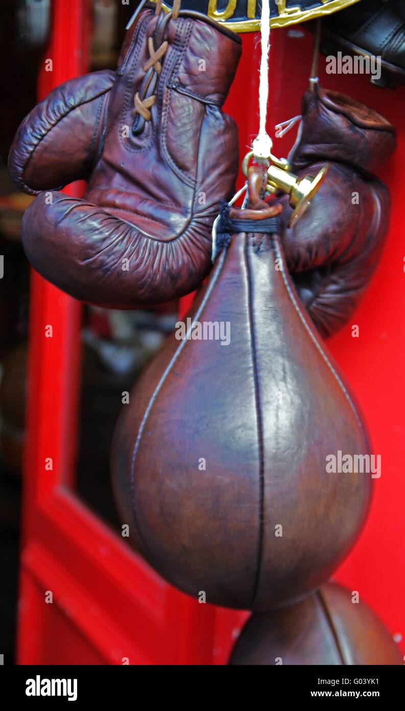 Leather boxing ball and a pair of boxing gloves Stock Photo Alamy