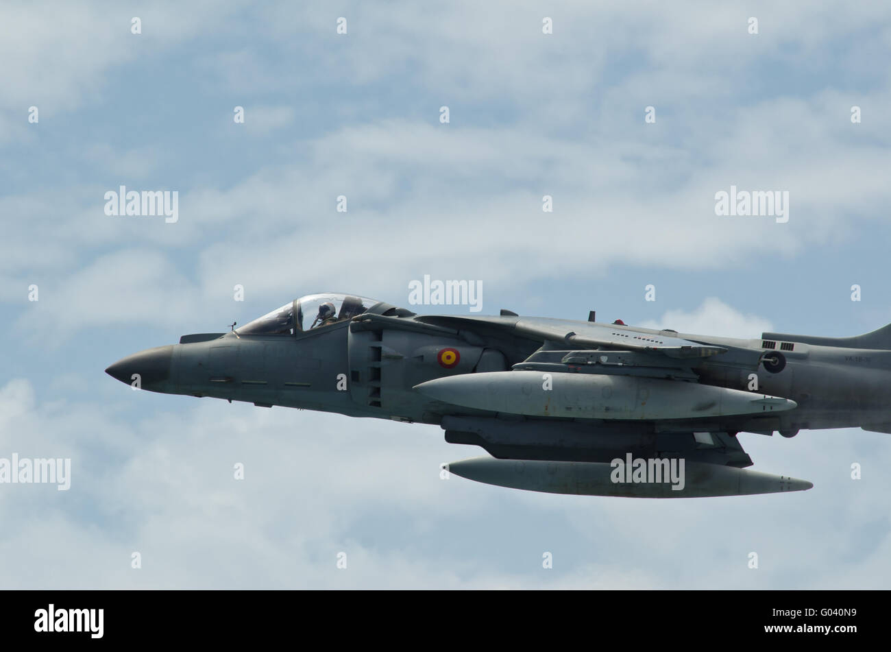Malaga (Spain) - 28 May: Celebration of Armed Forces Day at the beach of La Malagueta. Aircraft AV-8B Plus Harrier II making a s Stock Photo