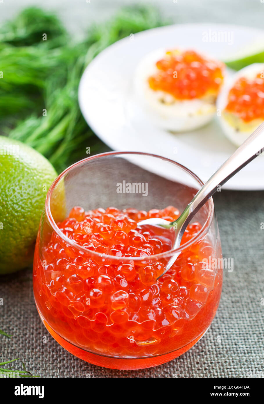 Caviar in glasses on dill and lime background close up Stock Photo