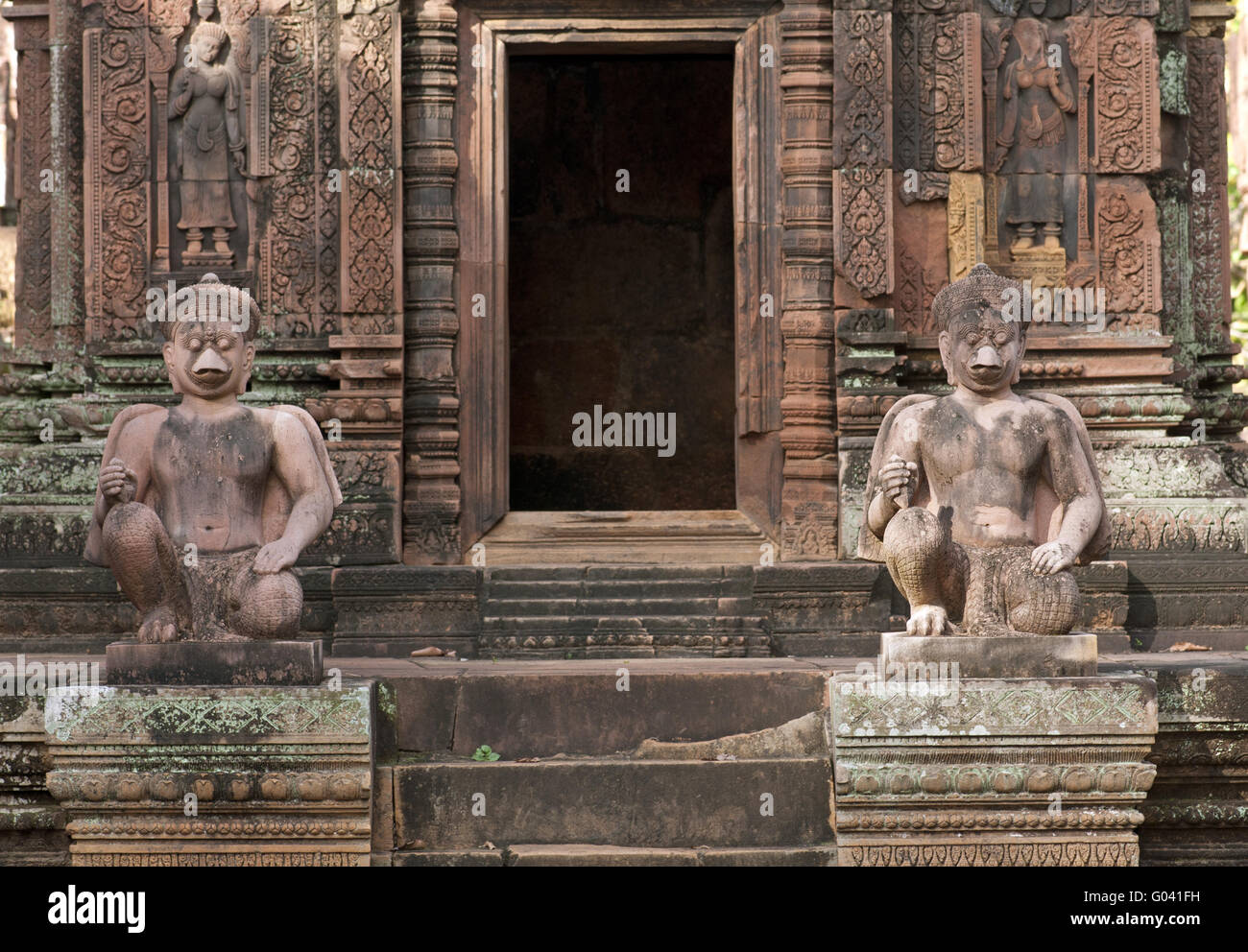 Replicas of two temple guardian statues,Banteay Stock Photo