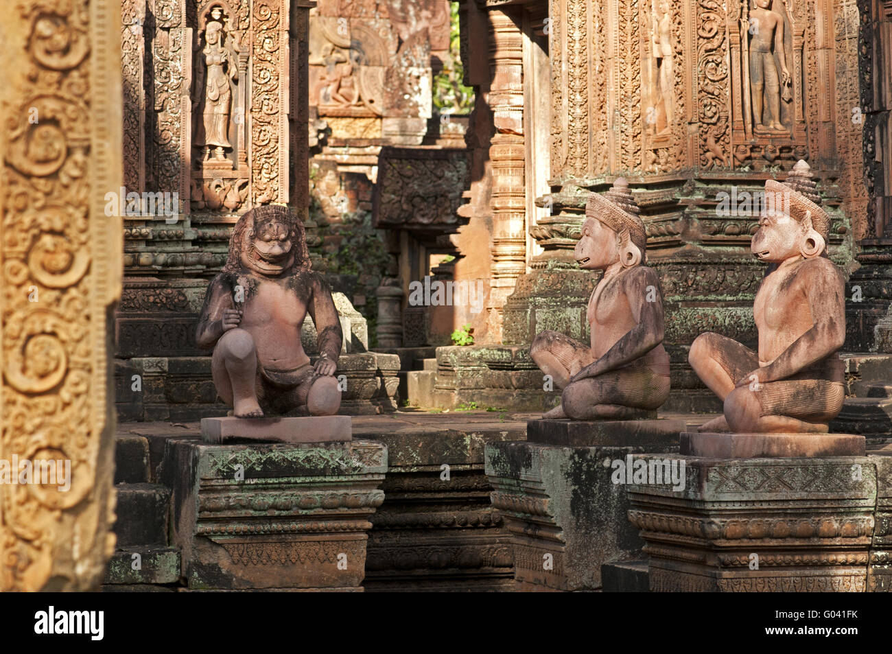 Replicas of temple guardian statues, Banteay Srei Stock Photo