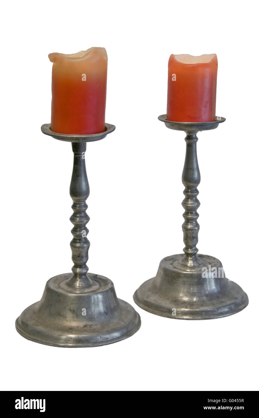 Two antik pewter candlesticks Stock Photo