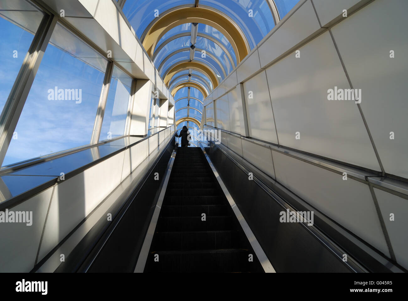 modern building interior with glass roof, moving e Stock Photo