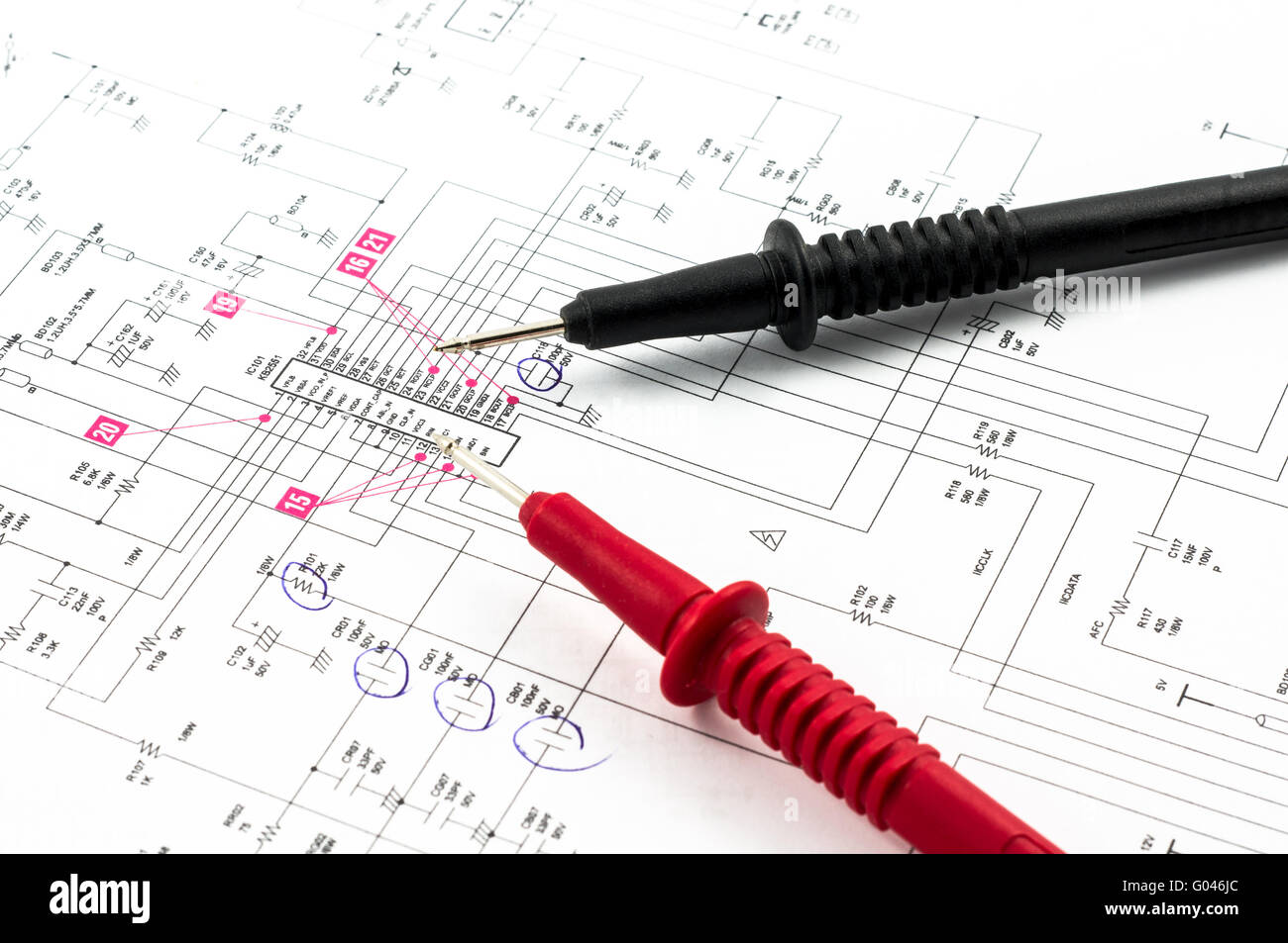 Electricity diagram (drawing or design) and pointed electrical test probes Stock Photo