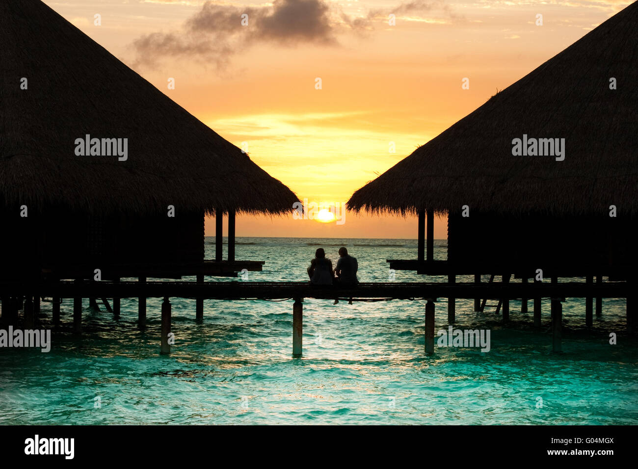Maldives Waterbungalow Sunset Stock Photo