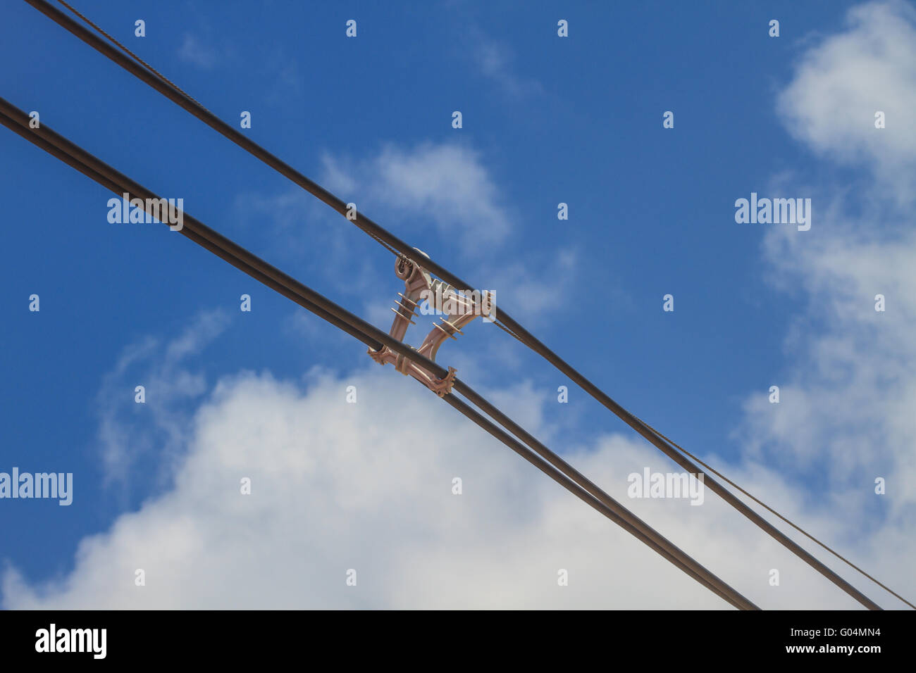 electricity pole on blue sky background in a village Stock Photo