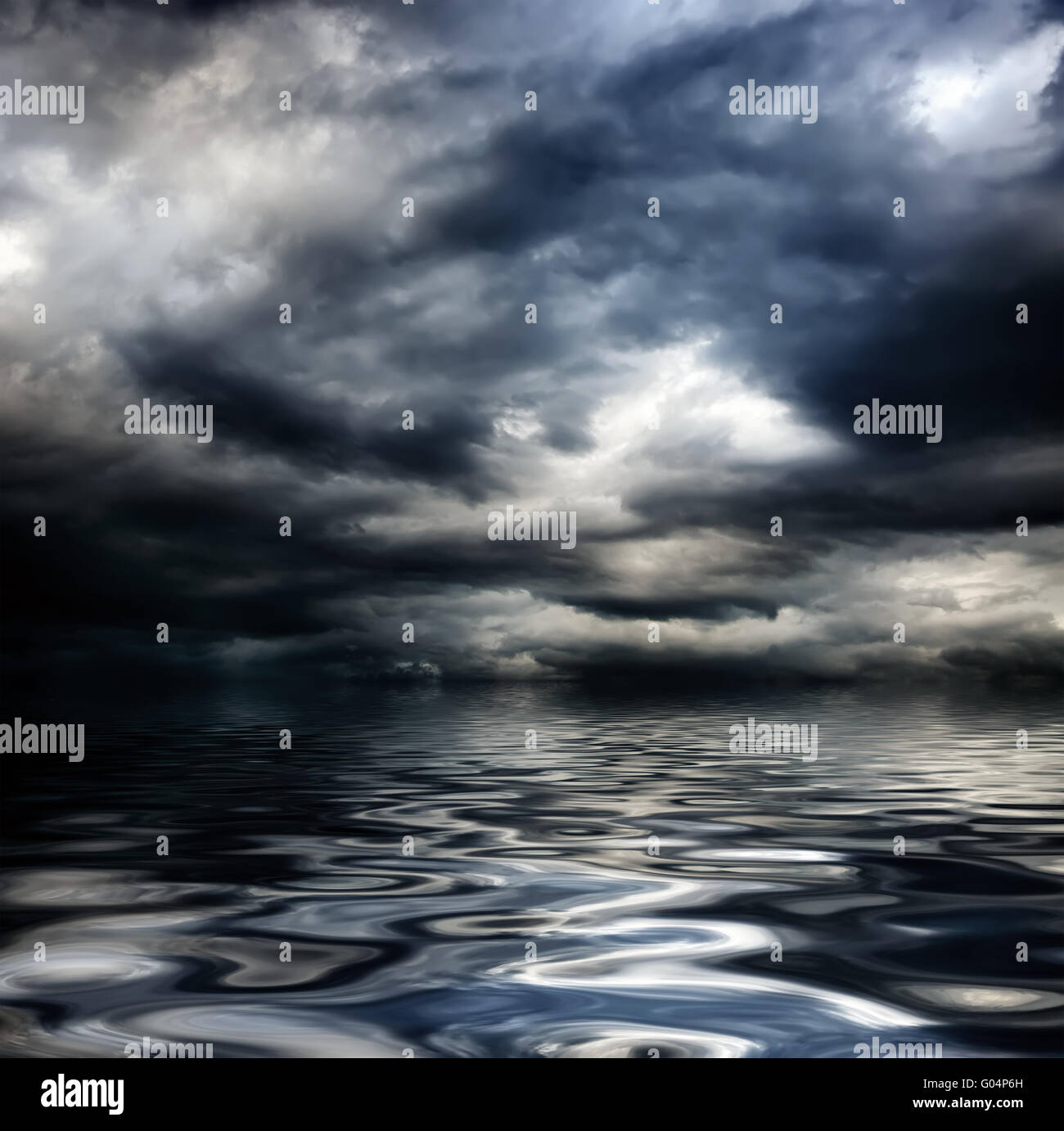 dark cloudy stormy sky with clouds and waves in the sea Stock Photo - Alamy