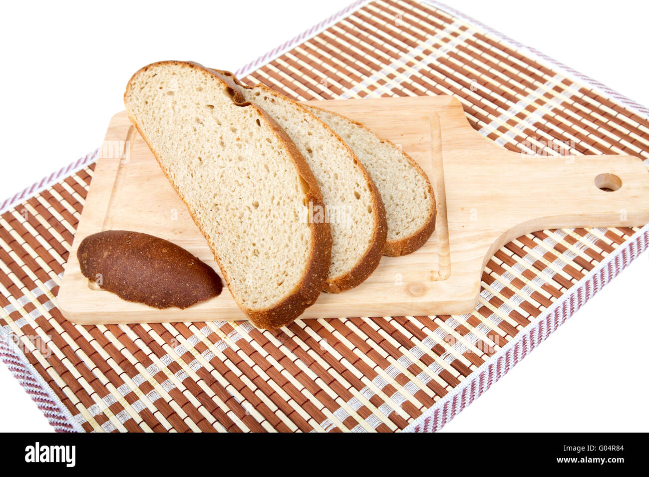 Still-life with bread slices isolated on a white Stock Photo