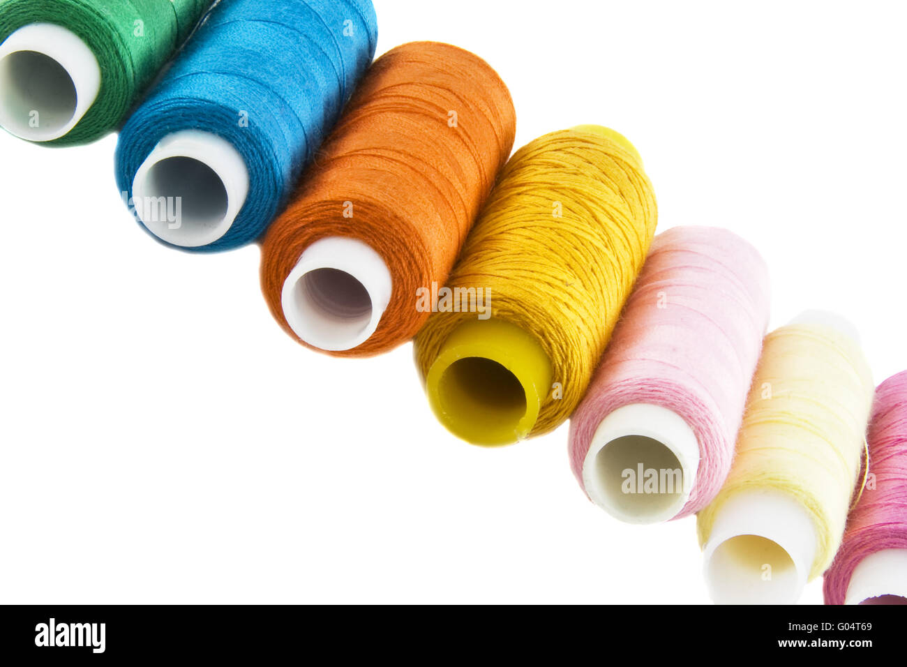 Many colorful threads over the white background Stock Photo