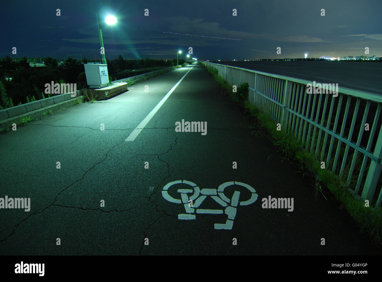 bicycle road going faraway on the Tokyo bay embank Stock Photo