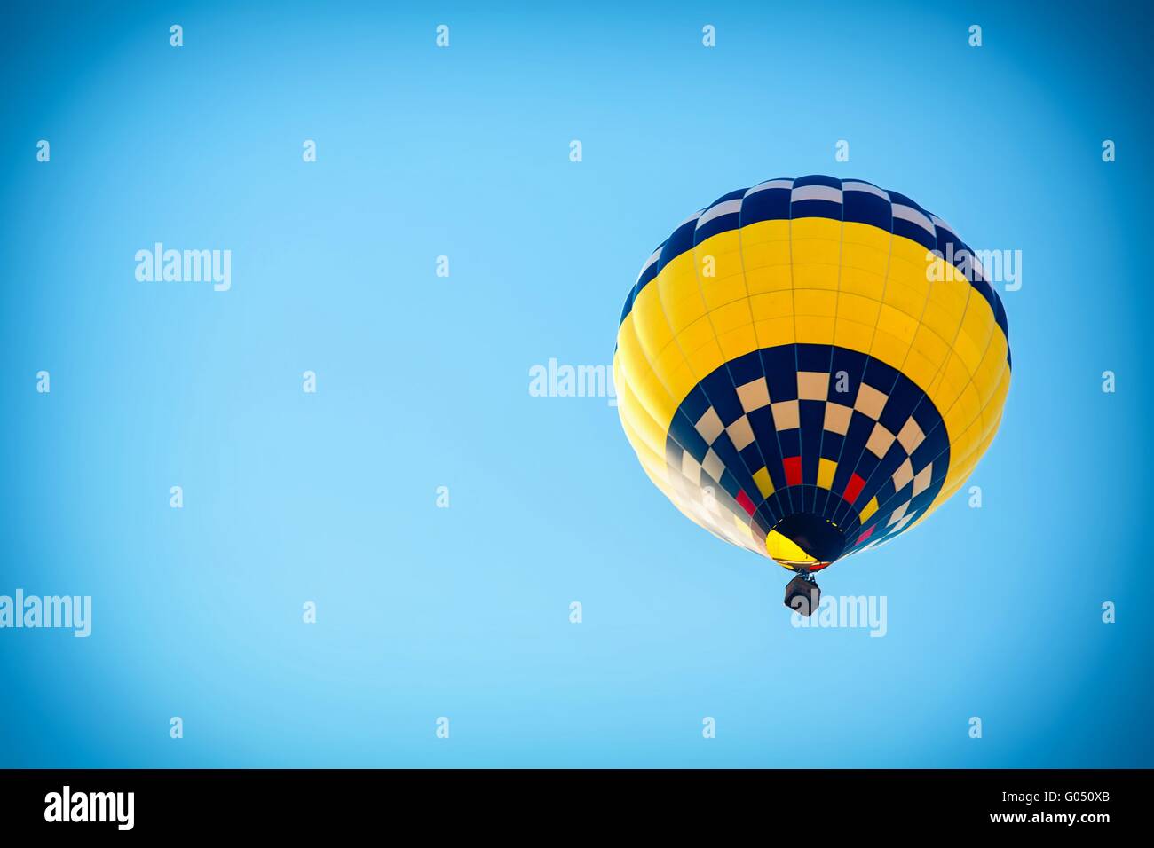 Beautiful colorful hot air balloon in the blue sky Stock Photo - Alamy