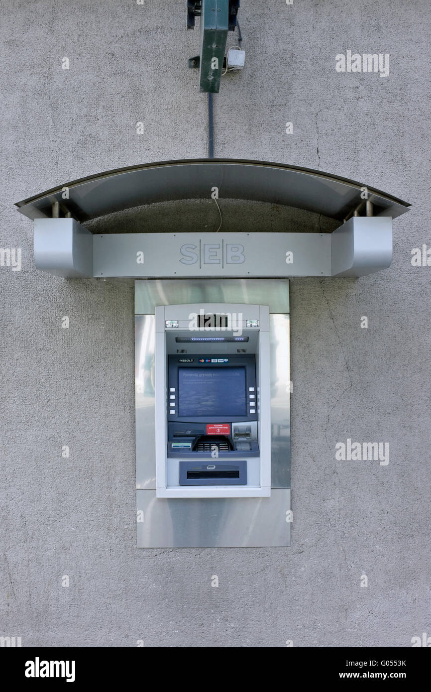 VILNIUS, LITHUANIA - MARCH 27, 2016: The street ATM of production of Diebold brand is built in a wall of SEB bank. Diebold and I Stock Photo