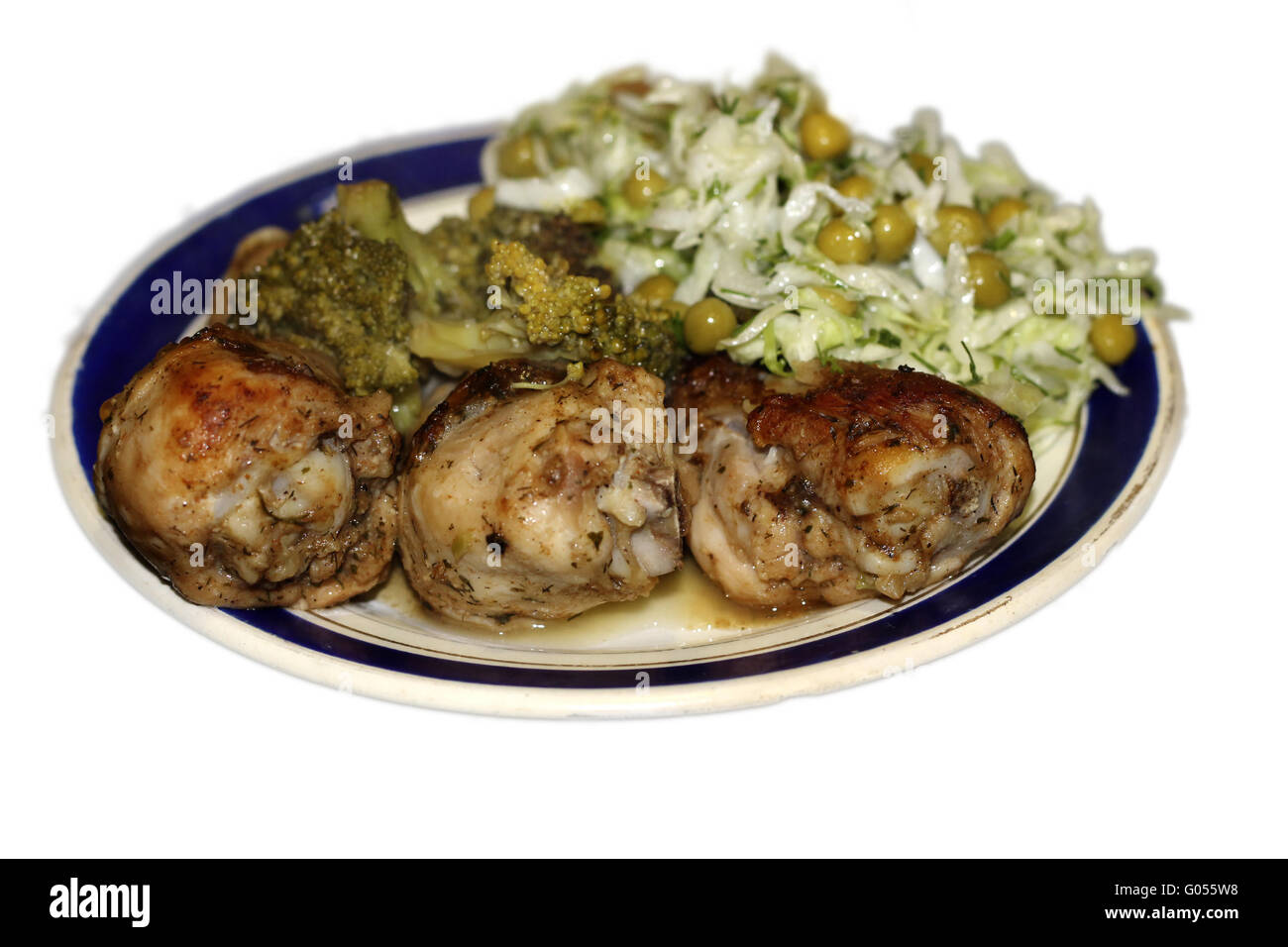 Fried chiken and cabbage broccoli on the plate Stock Photo