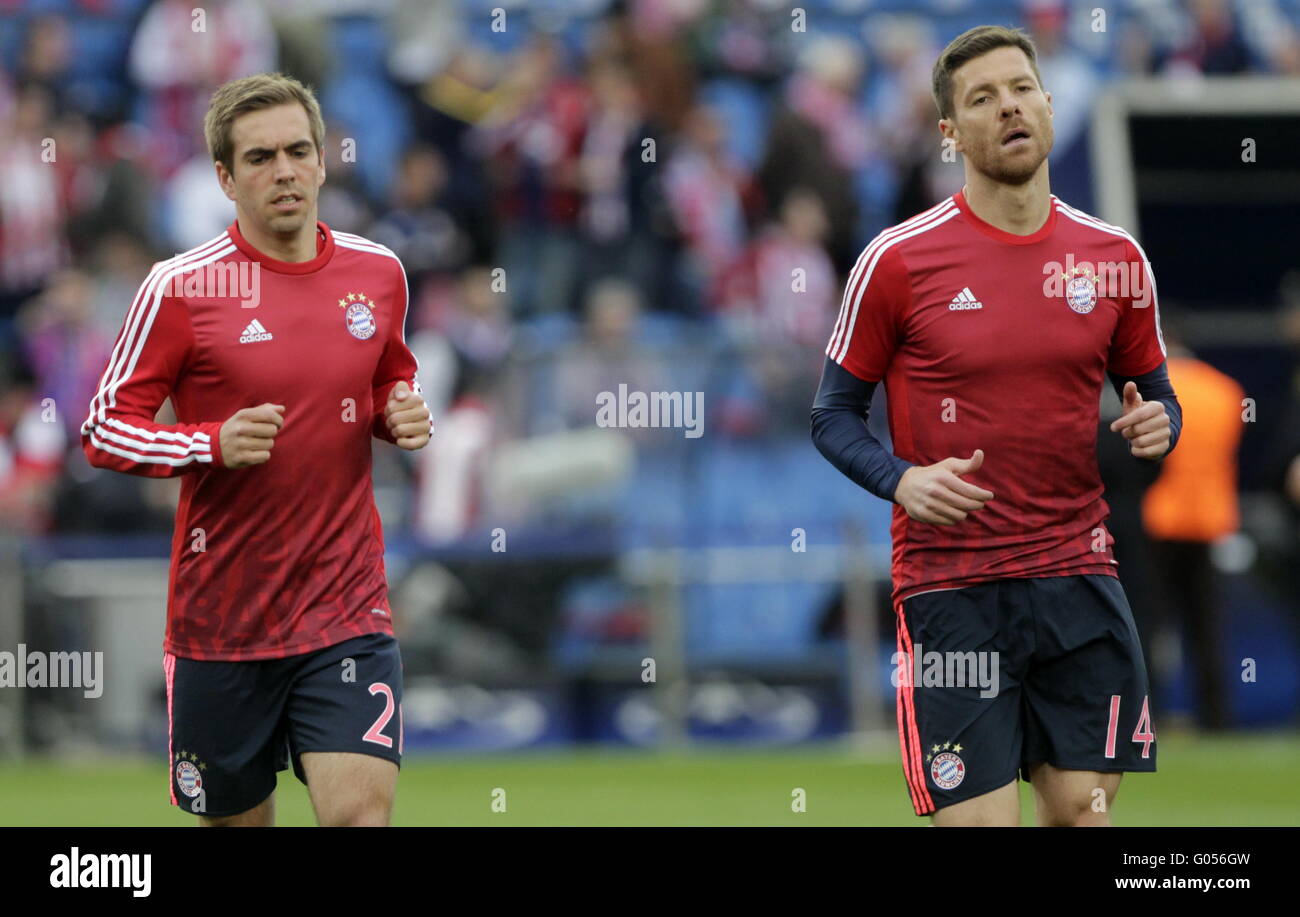 philip Lahm and Sergio Ramos of Bayern Munich in action during the match of Champions League Atletico Madrid - Bayern Munich Stock Photo