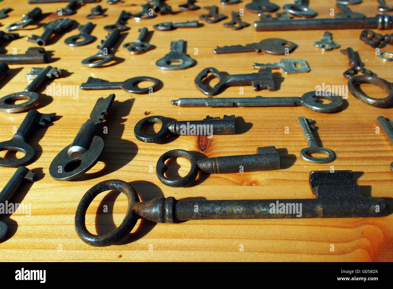 old keys on a board Stock Photo Alamy