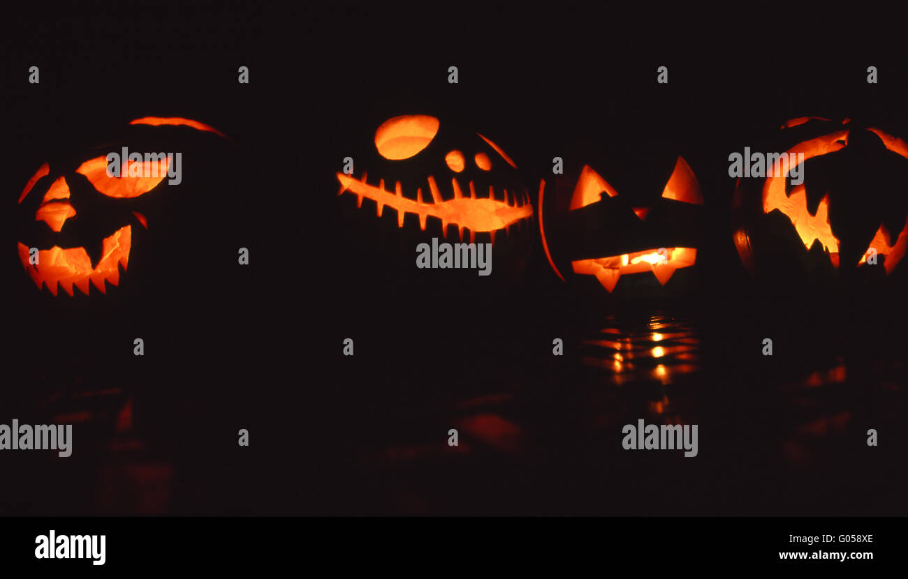 Glowing Halloween pumpkins Stock Photo