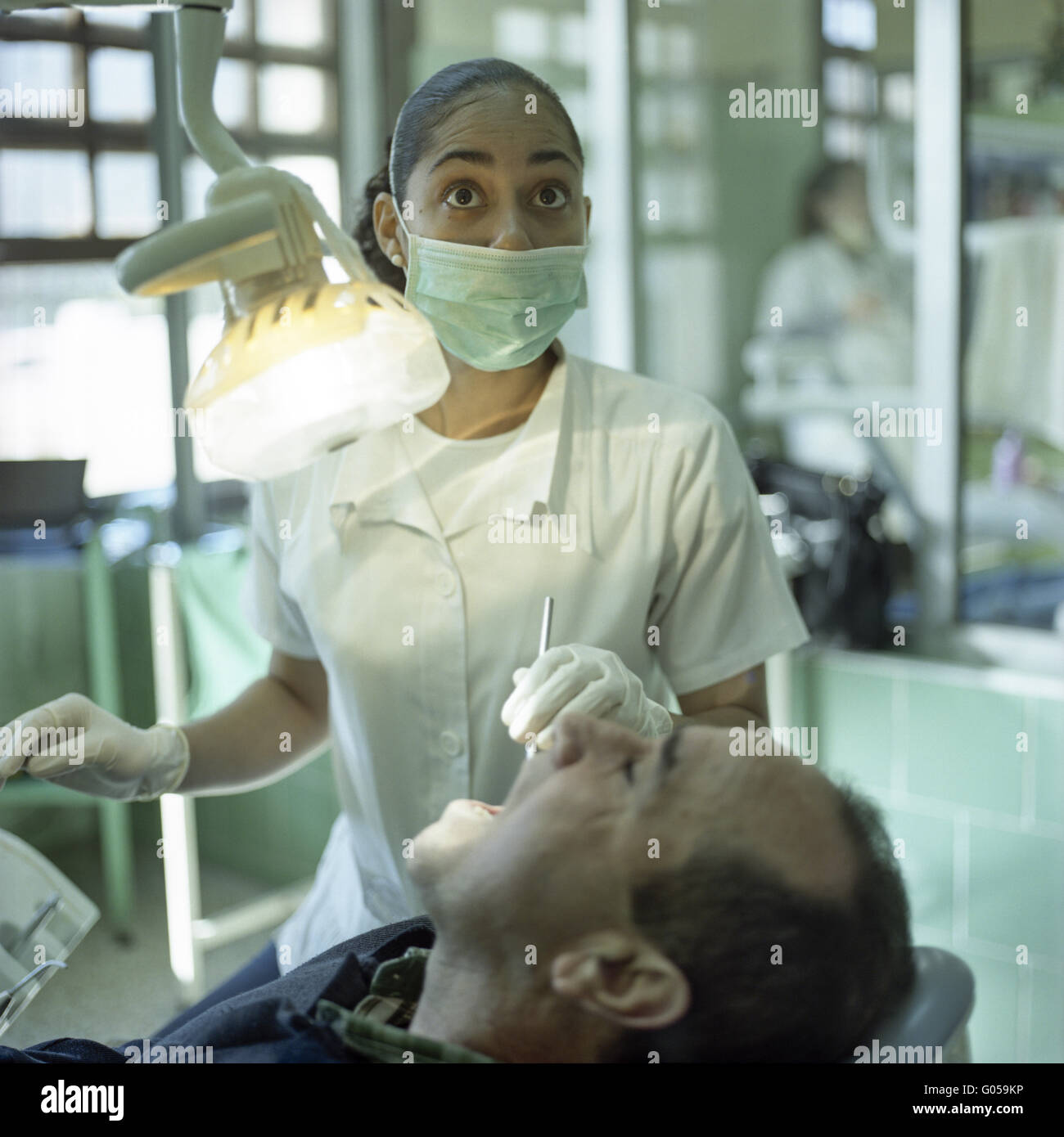 Latina dental nurse and patient Stock Photo