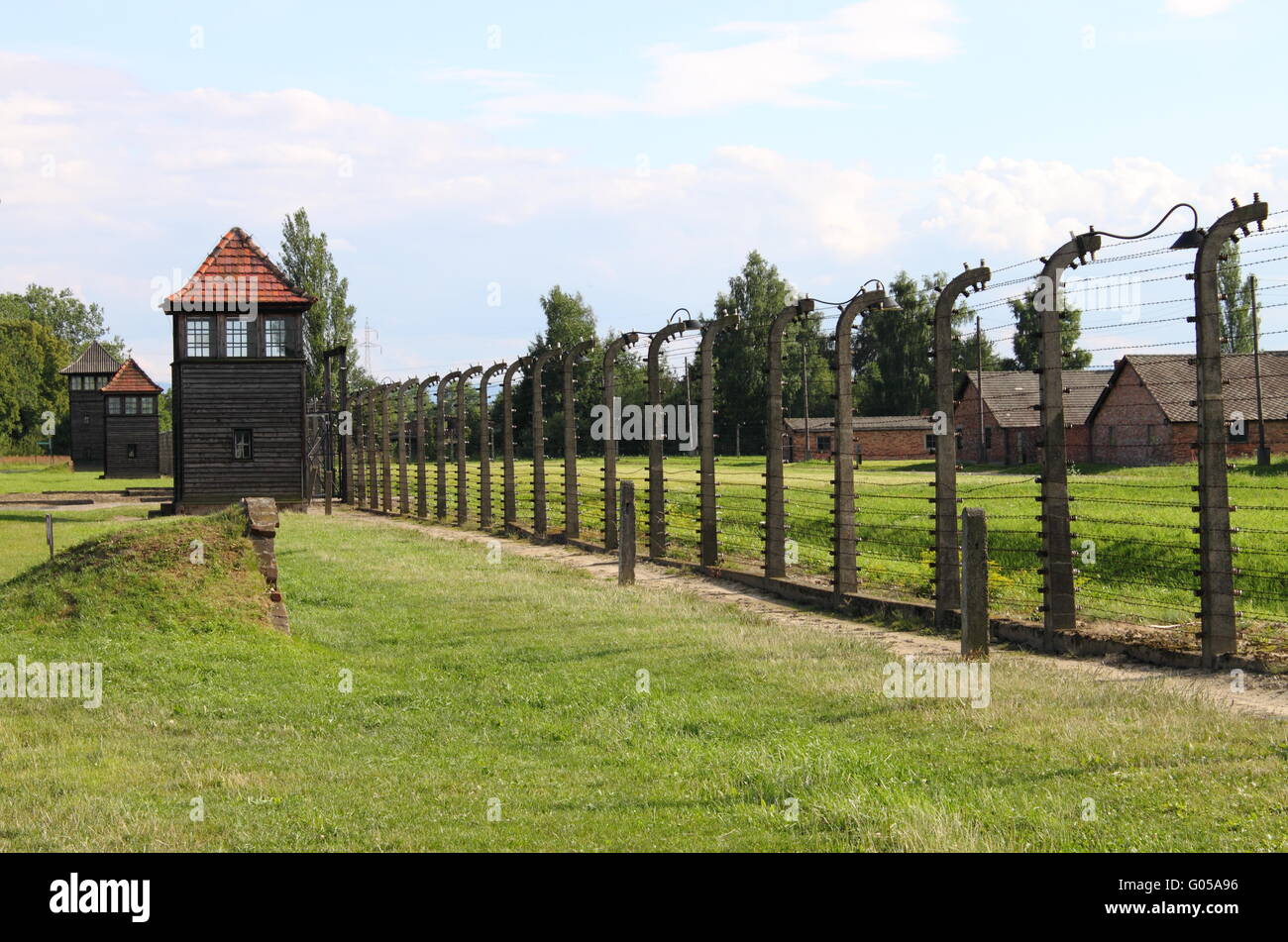 Barbed wire electrical fence at Auschwitz-Birkenau Stock Photo